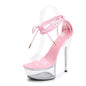Escarpins à talons aiguilles en cuir verni à plateforme transparente