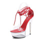 Escarpins à talons aiguilles en cuir verni à plateforme transparente